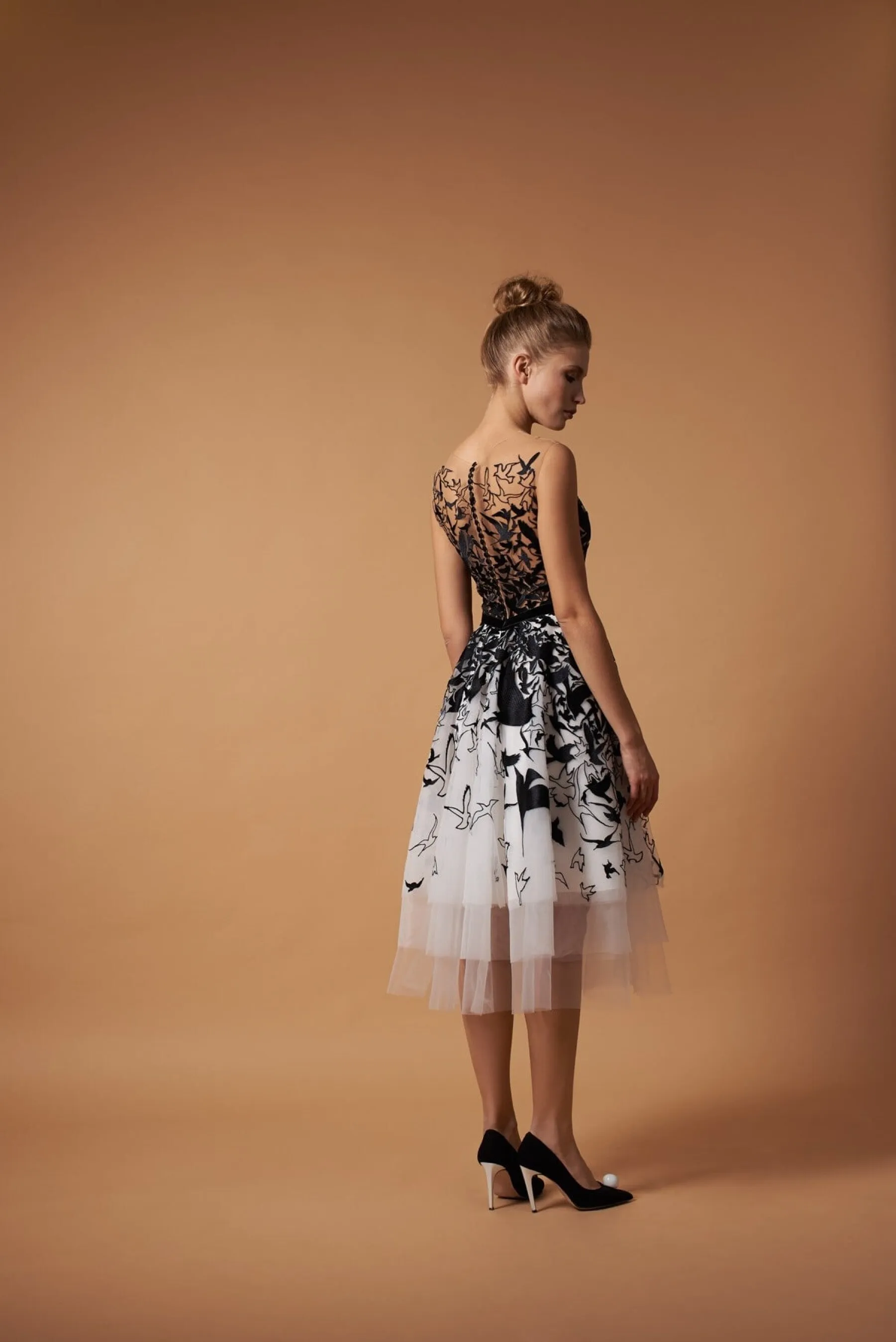 Whimsical Black and White Gown with Birds Motif